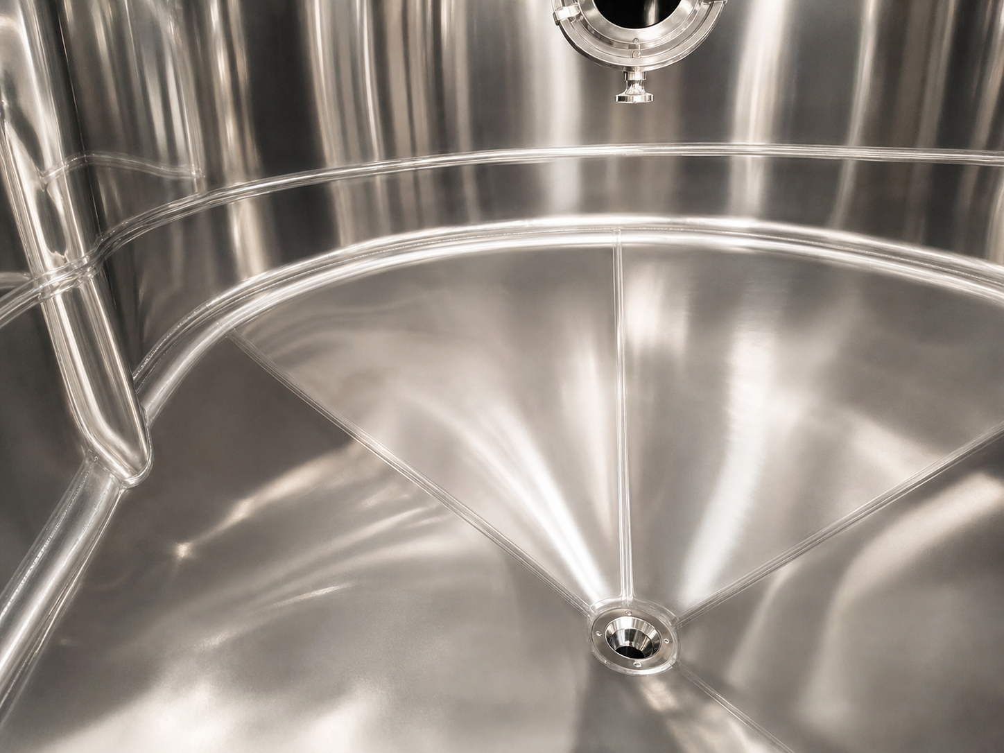 Polished welds and clean internal geometry inside a sanitary stainless steel tank